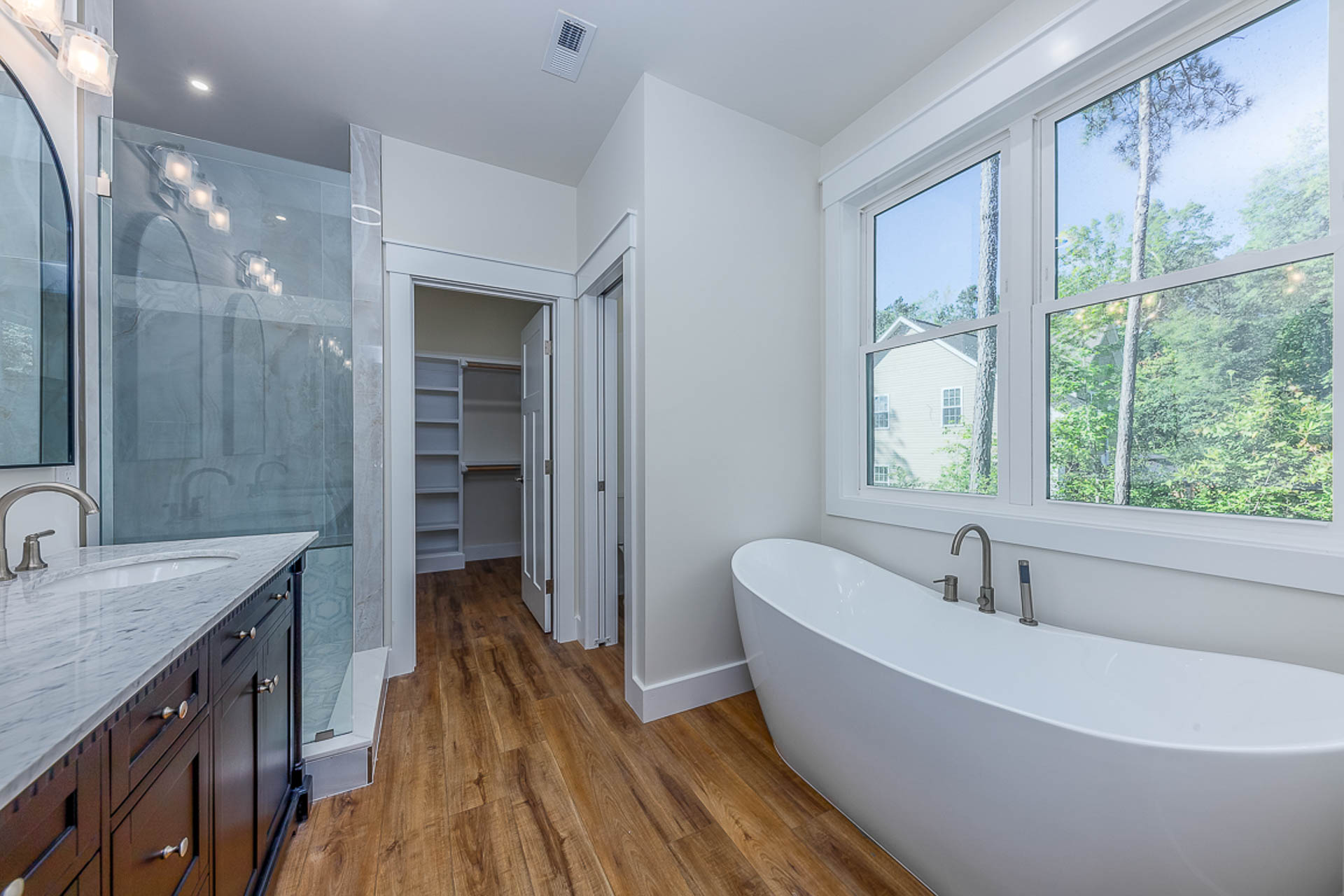 bathroom with white bowl bathtub